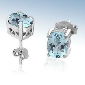 Pretty STERLING SILVER Oval 6.5x5mm TOPAZ Stud Earrings